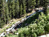Stream flowing steeply down the mountain